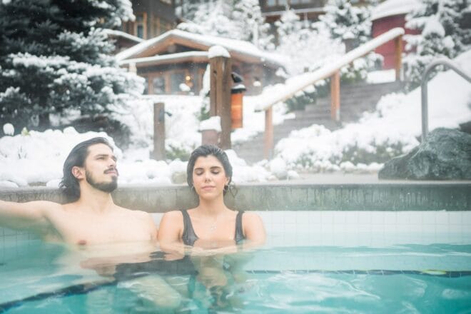 Couple relaxing during a spa day on their romantic Whistler getaway