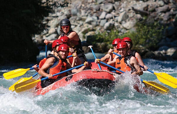 White water rafting through powerful rapids is one of whistler Whistler adrenaline fueled activities
